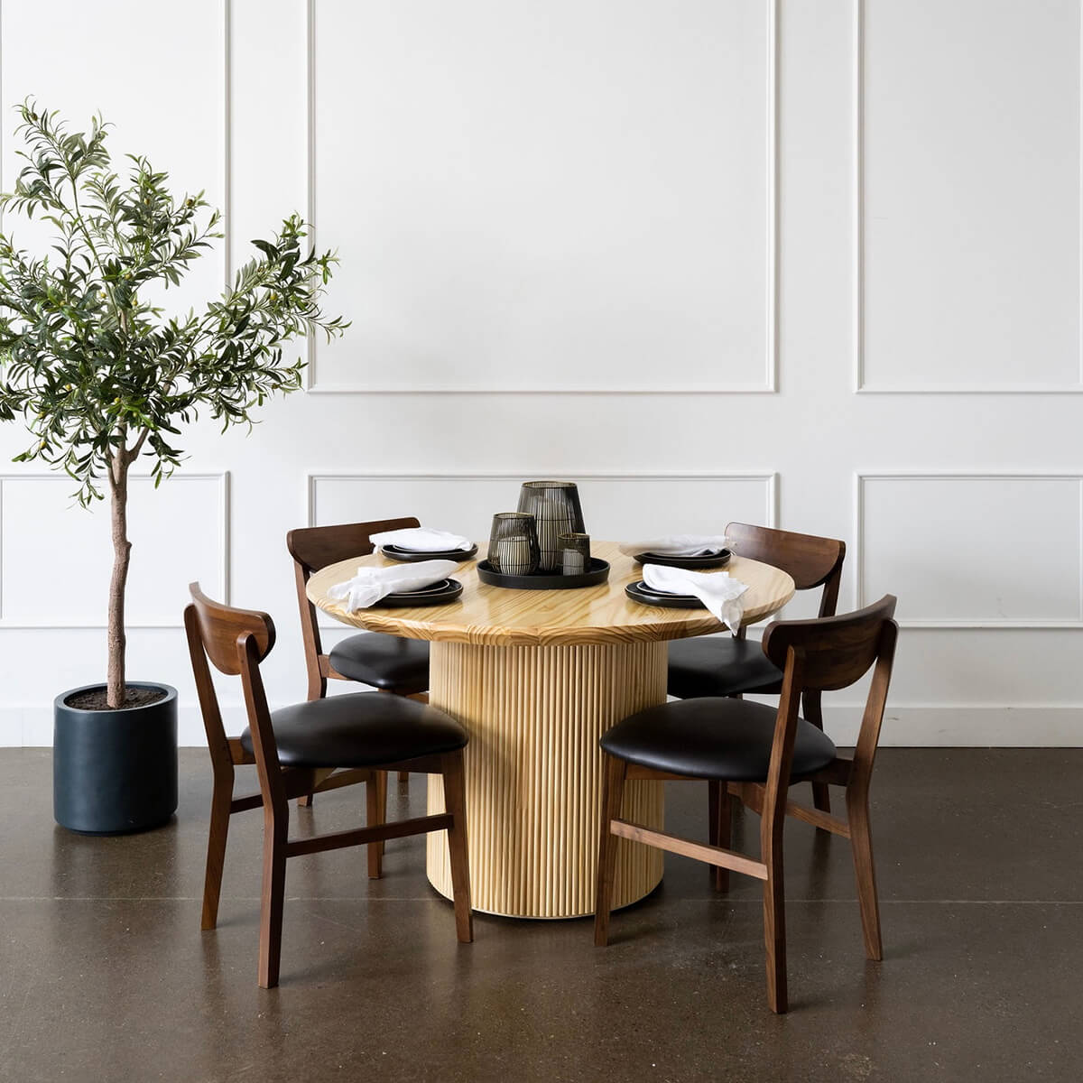 
                  
                    pine wood minimalist mid century modern round dining table with four walnut chairs
                  
                