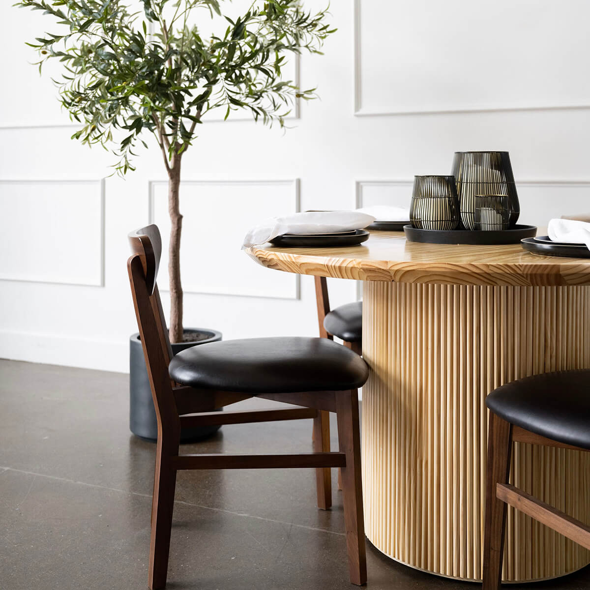 
                  
                    pine wood minimalist mid century modern round dining table - side view with walnut chairs
                  
                