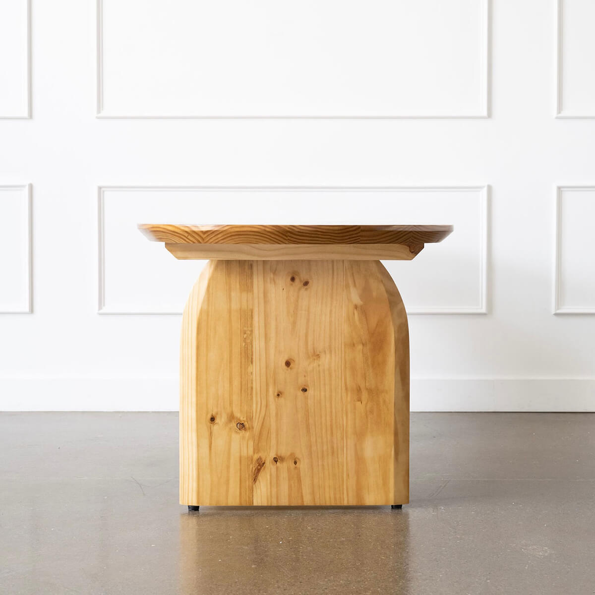 
                  
                    oak wood oval dining table side view
                  
                