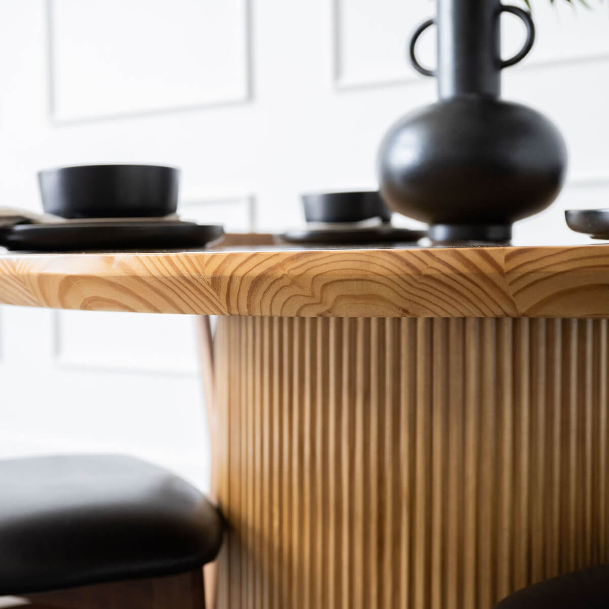 
                  
                    pine wood minimalist mid century modern round dining table - close-up of table edge
                  
                