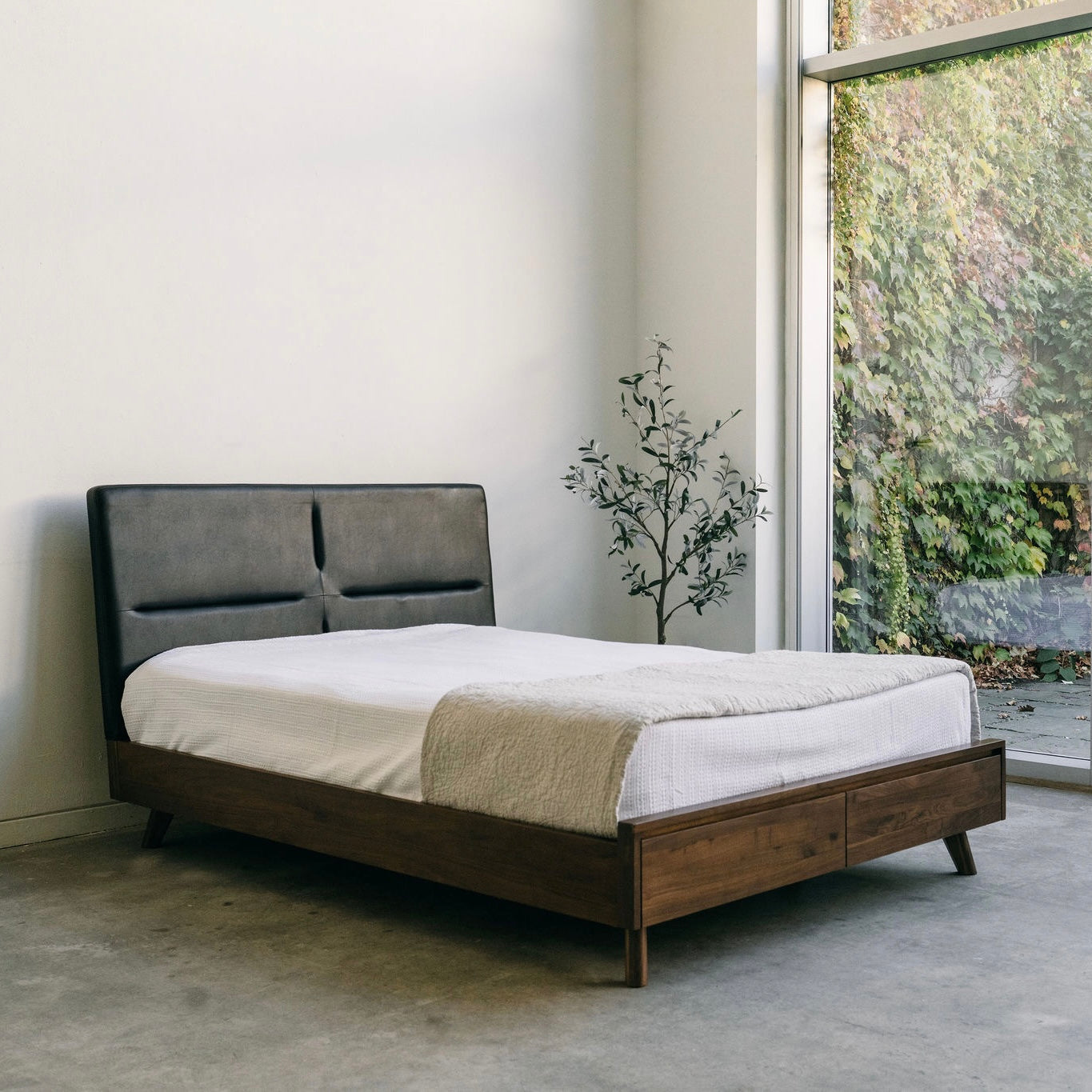 Mim Concept  best Modern furniture stores in Toronto, Ottawa and Mississauga to sell modern contemporary bedroom furniture and condo furniture. Italian leather headboard bed Low profile platform storage bed solid walnut wood