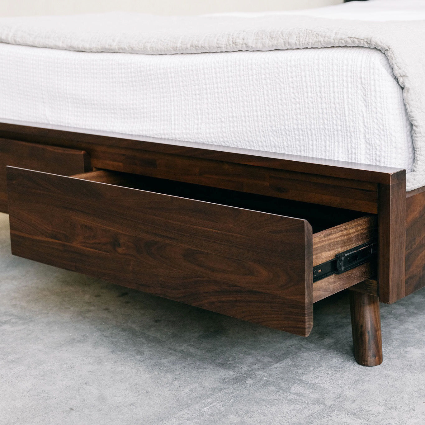 Mim Concept best Modern furniture stores in Toronto, Ottawa and Mississauga to sell modern contemporary bedroom furniture and condo furniture. Italian leather headboard bed Low profile platform storage bed solid walnut wood organic modern