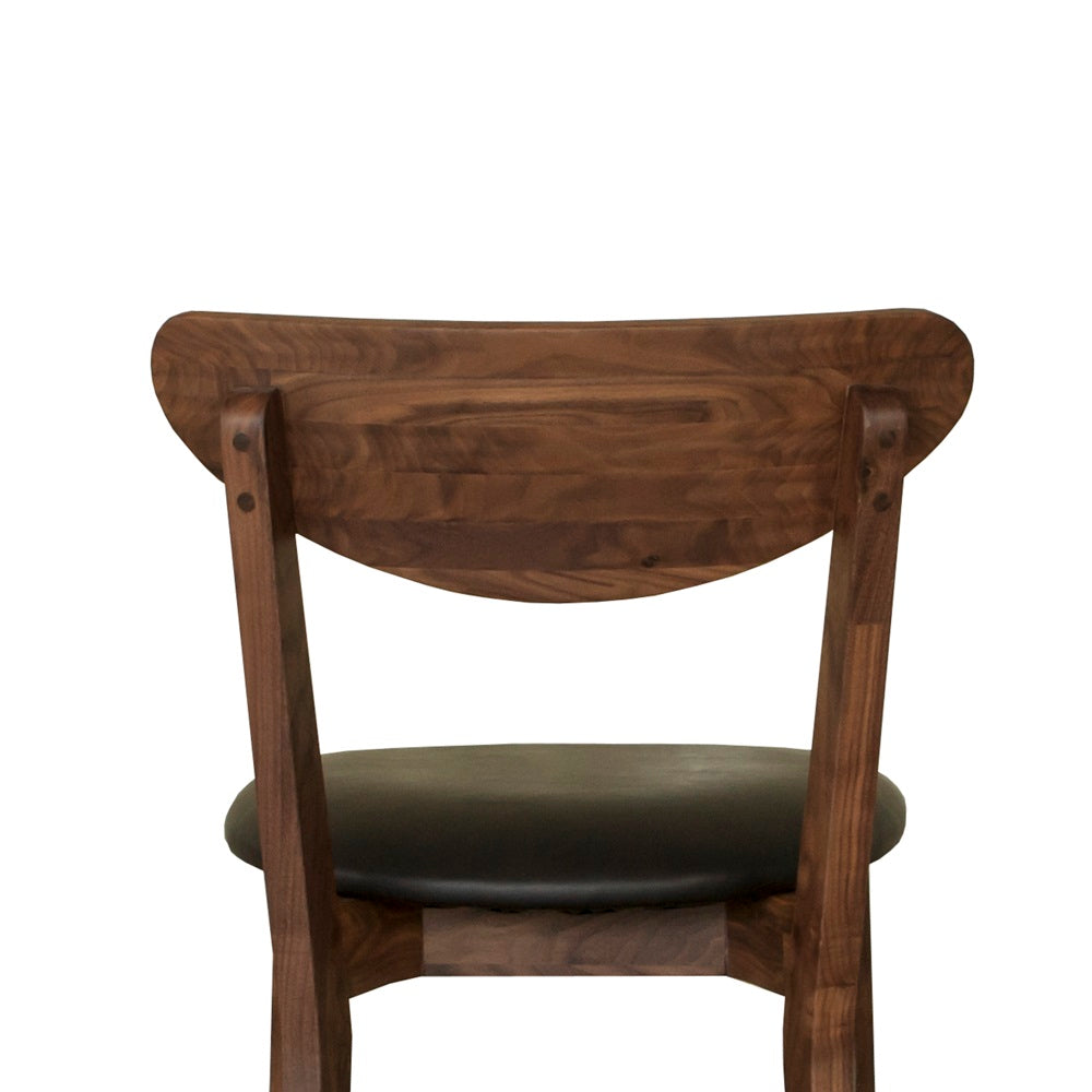 Walnut vegan leather mid century chairs. Mim Concept  best Modern furniture stores in Toronto, Ottawa and Mississauga to sell modern contemporary bedroom furniture and condo furniture. Minimal mid century modern dining table dinning chairs minimalist walnut wood modern organic luxury Scandinavian 