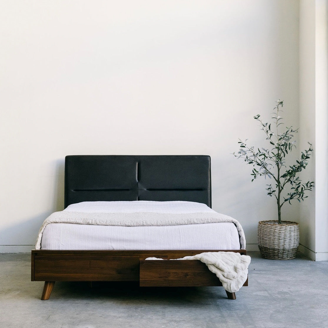 Mim Concept  best Modern furniture stores in Toronto, Ottawa and Mississauga to sell modern contemporary bedroom furniture and condo furniture. Italian leather headboard bed Low profile platform storage bed solid walnut wood