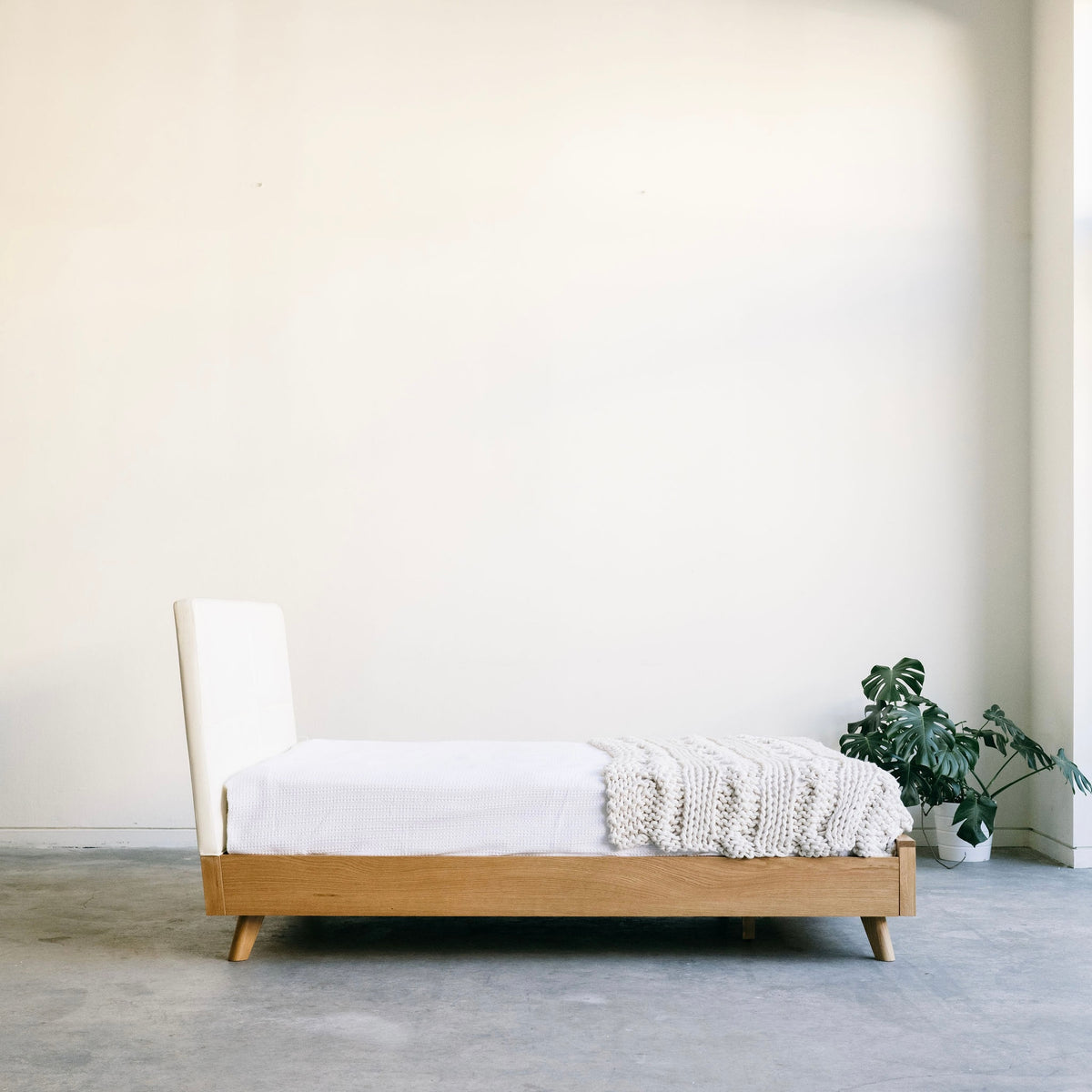 
                  
                    Mim Concept best Modern furniture stores in Toronto, Ottawa and Mississauga to sell modern contemporary bedroom furniture and condo furniture Italian leather headboard bed Low profile platform storage bed solid oak wood modern organic
                  
                