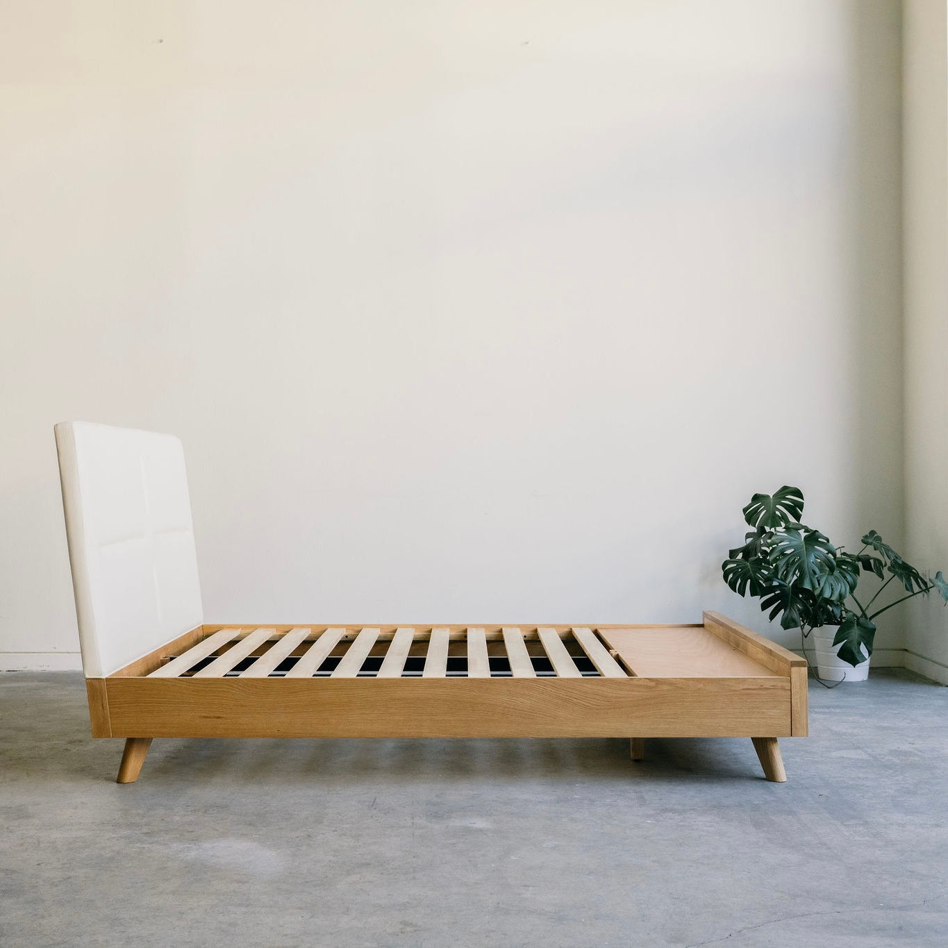 Mim Concept best Modern furniture stores in Toronto, Ottawa and Mississauga to sell modern contemporary bedroom furniture and condo furniture Italian leather headboard bed Low profile platform storage bed solid oak wood modern organic
