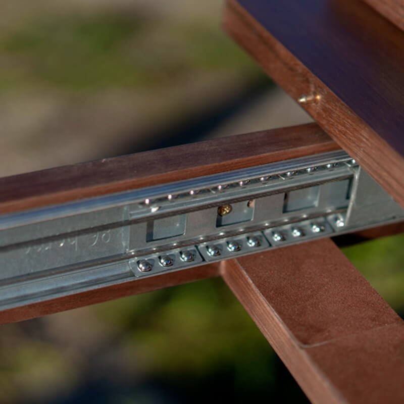 
                  
                    sliding component of extendable dining table - up close
                  
                