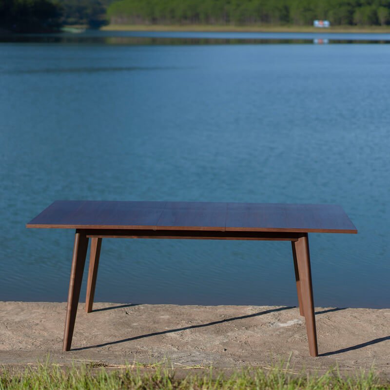 
                  
                     fully extended extendable walnut dining table
                  
                