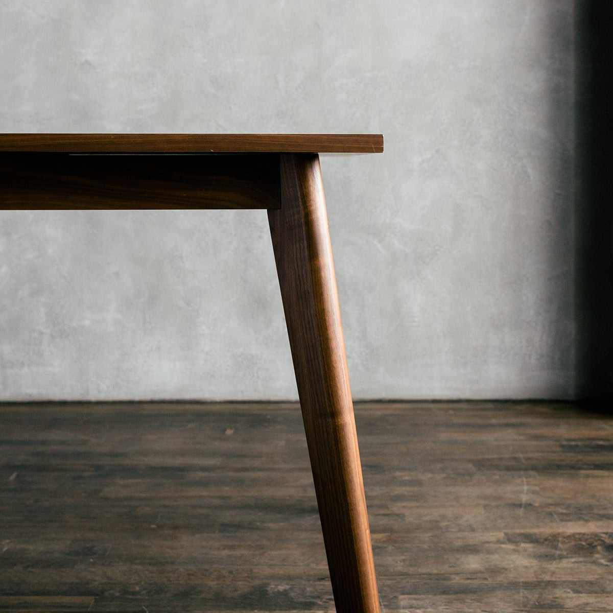 
                  
                    minimalist mid century modern walnut extendable dining table - leg view
                  
                